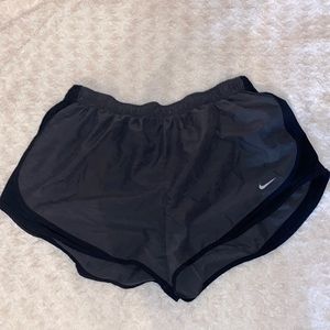 Dark grey and black Nike tempo shorts